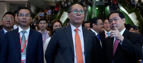 China's Ambassador to Mexico Qiu Xiaoqi listens to Mi Jiao Meng, Mayor of Huizhou City, during the Expo China Homelife Show, a platform for leading Chinese companies seeking to do business in Mexico, in Mexico City, Mexico June 13, 2017 - Sputnik International