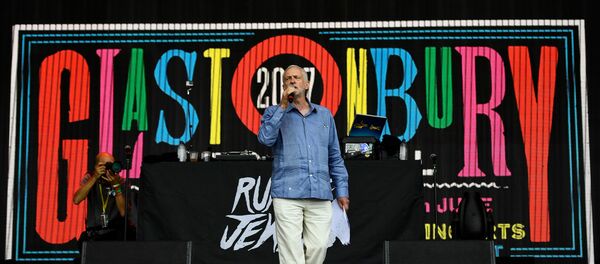 Britain's opposition Labour Party leader Jeremy Corbyn addresses revellers from the Pyramid Stage at Worthy Farm in Somerset during the Glastonbury Festival in Britain, June 24, 2017. - Sputnik International