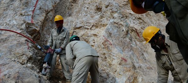 Afghan miners work at a gold mine on a mountainside near the village of Qara Zaghan in Baghlan province (File) Afghan miners work at a gold mine on a mountainside near the village of Qara Zaghan in Baghlan province (File) - Sputnik International