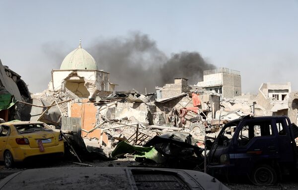 Smoke billows from the ruined Grand al-Nuri Mosque after it was retaken by the Iraqi forces at the Old City in Mosul, Iraq June 29, 2017 Smoke billows from the ruined Grand al-Nuri Mosque after it was retaken by the Iraqi forces at the Old City in Mosul, Iraq June 29, 2017 - Sputnik International