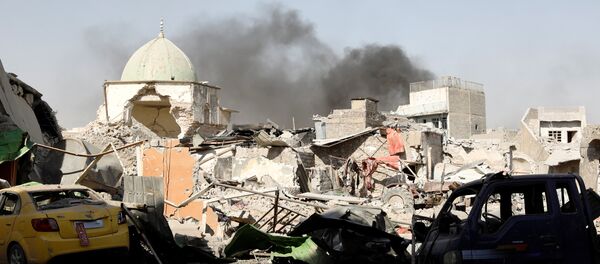 Smoke billows from the ruined Grand al-Nuri Mosque after it was retaken by the Iraqi forces at the Old City in Mosul, Iraq June 29, 2017 Smoke billows from the ruined Grand al-Nuri Mosque after it was retaken by the Iraqi forces at the Old City in Mosul, Iraq June 29, 2017 - Sputnik International