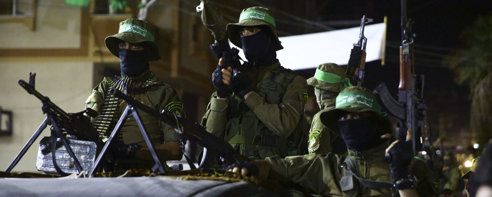 Masked militants from the Izzedine al-Qassam Brigades, a military wing of Hamas, ride vehicles during a rally marking Al-Quds, Jerusalem, Day in Nusseirat refugee camp, in the central Gaza Strip, Friday, June 23, 2017 - Sputnik International, 1920, 09.10.2023