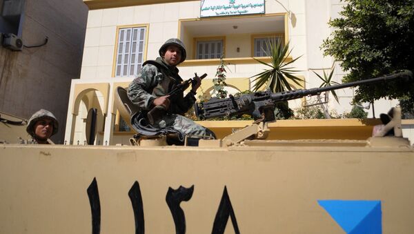 Egyptian soldiers are seen atop of a military vehicle in front of the Libyan consulate in the Egyptian costal city of Alexandria (File) - Sputnik International