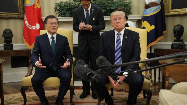 U.S. President Donald Trump (R) meets with South Korean President Moon Jae-in in the White House Oval Office in Washington, U.S., June 30, 2017 - Sputnik International