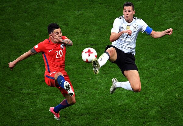 From left: Chile's Charles Aranguiz and Germany's Julian Draxler during the 2017 FIFA Confederations Cup match between Germany and Chile From left: Chile's Charles Aranguiz and Germany's Julian Draxler during the 2017 FIFA Confederations Cup match between Germany and Chile - Sputnik International