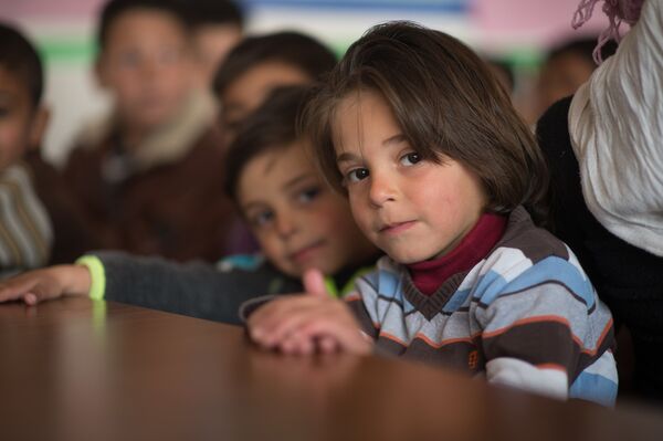 Children in a refugee camp located in a school building, Damascus Children in a refugee camp located in a school building, Damascus - Sputnik International