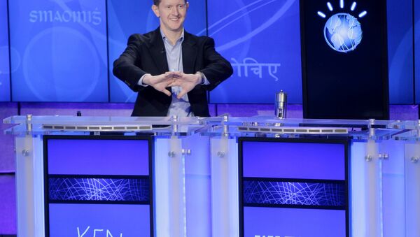 Jeopardy! contestant Ken Jennings, who won a record 74 consecutive games, cracks his knuckles before starting a practice match against another Jeopardy! champion and an IBM computer called Watson in Yorktown Heights, N.Y., Thursday, Jan. 13, 2011. It's the size of 10 refrigerators, and it swallows encyclopedias whole, but an IBM computer was lacking one thing it needed to battle the greatest champions from the Jeopardy! quiz TV show - it couldn't hit a buzzer. - Sputnik International