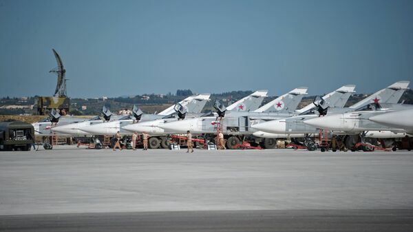 Su-24 bombers of the Russian Aerospace Forces at the Khmeimim airbase in Syria. - Sputnik International