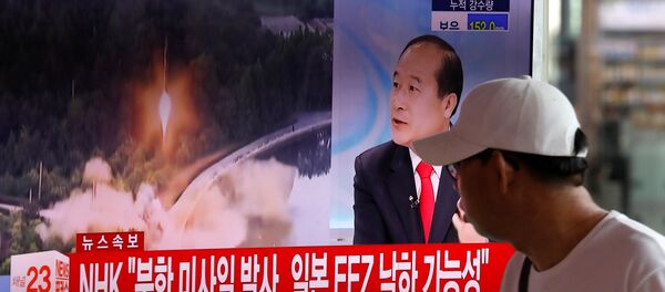 A man watches a TV broadcast of a news report on North Korea's ballistic missile test, at a railway station in Seoul, South Korea, July 4, 2017. A man watches a TV broadcast of a news report on North Korea's ballistic missile test, at a railway station in Seoul, South Korea, July 4, 2017. - Sputnik International