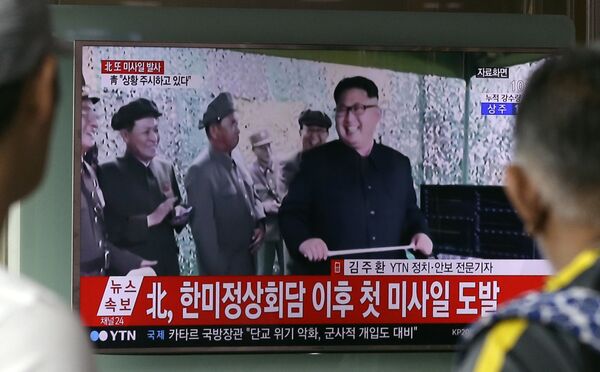 A TV news program shows a file image of North Korean leader Kim Jong Un, at Seoul Railway Station in Seoul, South Korea. in Seoul, South Korea, Tuesday, July 4, 2017. A TV news program shows a file image of North Korean leader Kim Jong Un, at Seoul Railway Station in Seoul, South Korea. in Seoul, South Korea, Tuesday, July 4, 2017. - Sputnik International
