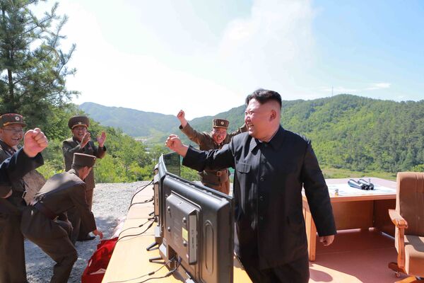 North Korean Leader Kim Jong Un reacts during the test-fire of intercontinental ballistic missile Hwasong-14 in this undated photo released by North Korea's Korean Central News Agency (KCNA) in Pyongyang, July, 4 2017.  - Sputnik International