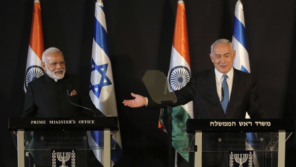 Indian Prime Minister Narendra Modi, left, listens as Israeli Prime Minister Benjamin Netanyahu speaks during their meeting at the King David hotel in Jerusalem, - Sputnik International