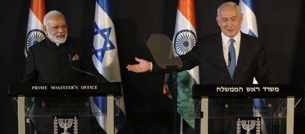 Indian Prime Minister Narendra Modi, left, listens as Israeli Prime Minister Benjamin Netanyahu speaks during their meeting at the King David hotel in Jerusalem, - Sputnik International