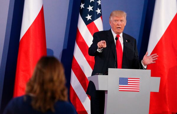 US President Donald Trump gestures during a joint news conference with Polish President Andrzej Duda in Warsaw, Poland July 6, 2017. - Sputnik International