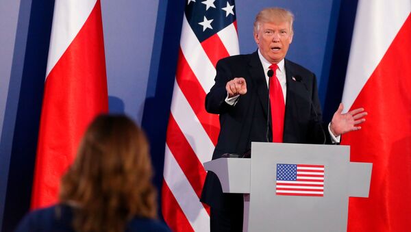 US President Donald Trump gestures during a joint news conference with Polish President Andrzej Duda in Warsaw, Poland July 6, 2017. - Sputnik International