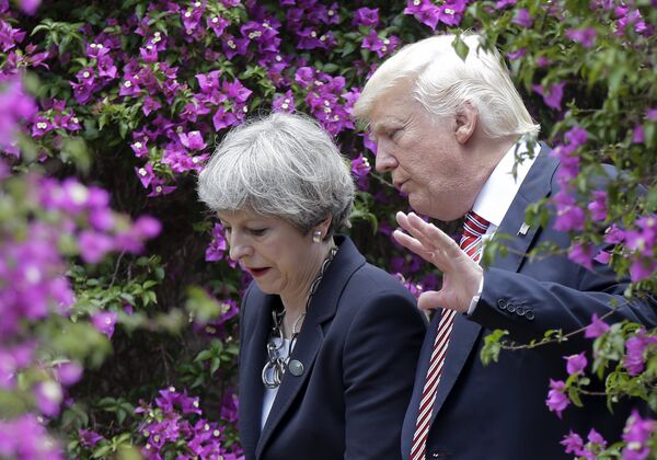 US President Donald Trump, right, talks with British Prime Minister Theresa May in Taormina, Italy, Friday, May 26, 2017. US President Donald Trump, right, talks with British Prime Minister Theresa May in Taormina, Italy, Friday, May 26, 2017. - Sputnik International