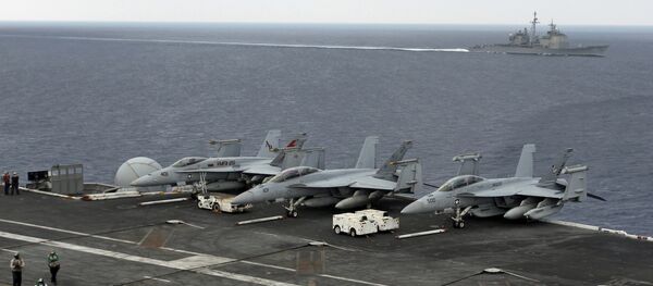 (File) The USS Normandy sails in the Bay of Bengal as U.S. Navy fighter aircrafts are stationed at the flight deck of aircraft carrier USS Theodore Roosevelt (CVN 71) during Exercise Malabar 2015, some 152 miles off eastern coast of Chennai, India, Saturday, Oct. 17, 2015 (File) The USS Normandy sails in the Bay of Bengal as U.S. Navy fighter aircrafts are stationed at the flight deck of aircraft carrier USS Theodore Roosevelt (CVN 71) during Exercise Malabar 2015, some 152 miles off eastern coast of Chennai, India, Saturday, Oct. 17, 2015 - Sputnik International