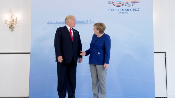 German Chancellor Angela Merkel meets U.S. President Donald Trump on the eve of the G-20 summit in Hamburg, Germany, July 6, 2017 - Sputnik International