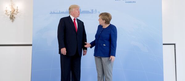 German Chancellor Angela Merkel meets U.S. President Donald Trump on the eve of the G-20 summit in Hamburg, Germany, July 6, 2017 - Sputnik International