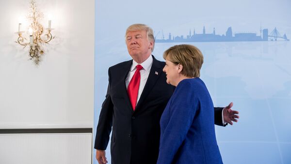 German Chancellor Angela Merkel meets U.S. President Donald Trump on the eve of the G-20 summit in Hamburg, Germany, July 6, 2017 - Sputnik International