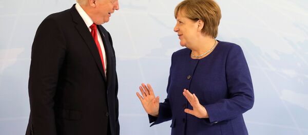 German Chancellor Angela Merkel meets U.S. President Donald Trump on the eve of the G-20 summit in Hamburg, Germany, July 6, 2017 German Chancellor Angela Merkel meets U.S. President Donald Trump on the eve of the G-20 summit in Hamburg, Germany, July 6, 2017 - Sputnik International