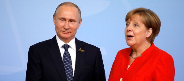 German Chancellor Angela Merkel welcomes Russia's President Vladimir Putin at the G20 summit in Hamburg, Germany July 7, 2017 German Chancellor Angela Merkel welcomes Russia's President Vladimir Putin at the G20 summit in Hamburg, Germany July 7, 2017 - Sputnik International