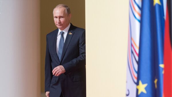 Russia's President Vladimir Putin arrives to attend the G20 summit in Hamburg, northern Germany, on July 7, 2017 - Sputnik International