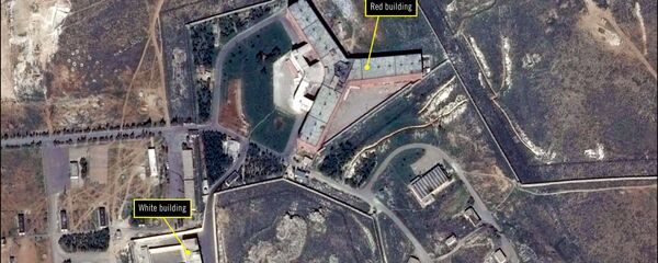 A handout satellite image released by The French national Space study centre (CNES) and the ASTRIUM, the aerospace maufacture subsiduary of the European Aeronautic Defence and Space Company (EADS) and received from Amnesty International on February 7, 2017 by shows the military-run Saydnaya prison, one of Syria's largest detention centres located 30 kilometres (18 miles) north of Damascus. A handout satellite image released by The French national Space study centre (CNES) and the ASTRIUM, the aerospace maufacture subsiduary of the European Aeronautic Defence and Space Company (EADS) and received from Amnesty International on February 7, 2017 by shows the military-run Saydnaya prison, one of Syria's largest detention centres located 30 kilometres (18 miles) north of Damascus. - Sputnik International