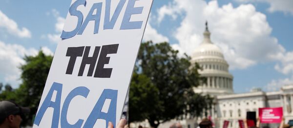 Protestors gather during a demonstration against the Republican repeal of the Affordable Care Act, outside the U.S. Capitol in Washington, U.S., June 21, 2017 - Sputnik International