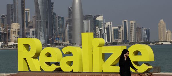 A women walks at the corniche seaside, in Doha, Qatar, on Sunday Jan. 23, 2011. - Sputnik International
