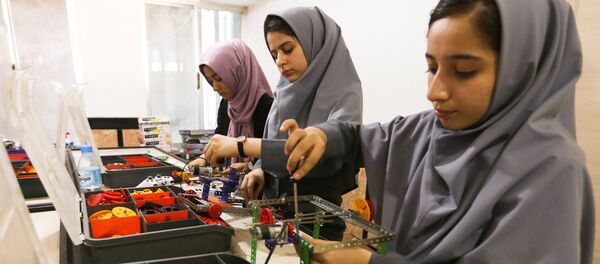 Members of Afghan robotics girls team which was denied entry into the United States for a competition, work on their robots in Herat province, Afghanistan July 4, 2017 Members of Afghan robotics girls team which was denied entry into the United States for a competition, work on their robots in Herat province, Afghanistan July 4, 2017 - Sputnik International