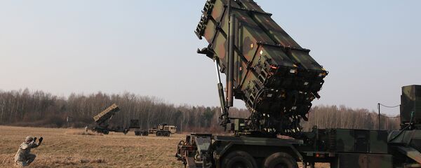 U.S. troops from 5th Battalion of the 7th Air Defense Regiment are seen at a test range in Sochaczew, Poland, on Saturday, March 21, 2015 - Sputnik International