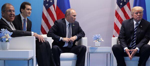 U.S. President Donald Trump meets with Russian President Vladimir Putin at the G20 summit in Hamburg, Germany July 7, 2017 - Sputnik International
