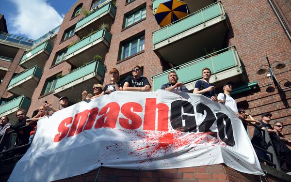 Participants in the protest rally ahead of the G20 Summit In Hamburg - Sputnik International