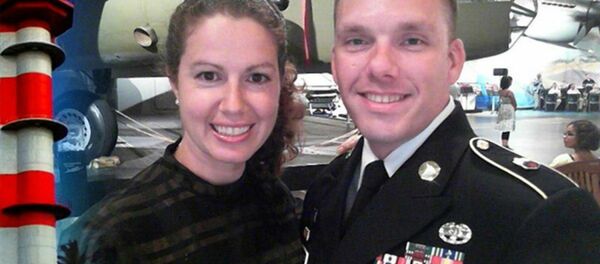 Private Michael Walker, left, pictured, with his wife Catherine, right, who he conspired to kill with his girlfriend. Private Michael Walker, left, pictured, with his wife Catherine, right, who he conspired to kill with his girlfriend. - Sputnik International