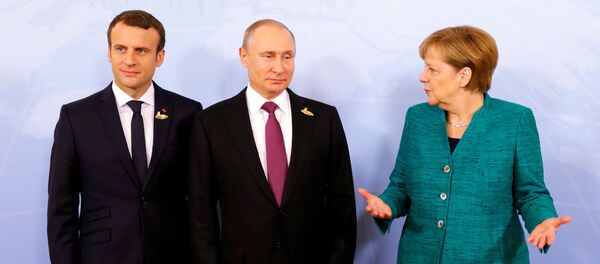 German Chancellor Angela Merkel, Russian President Vladimir Putin and French President Emmanuel Macron meet during the G20 leaders summit in Hamburg, Germany July 8, 2017 German Chancellor Angela Merkel, Russian President Vladimir Putin and French President Emmanuel Macron meet during the G20 leaders summit in Hamburg, Germany July 8, 2017 - Sputnik International
