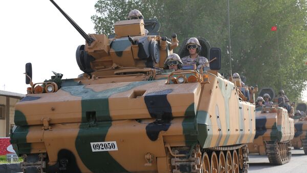 Turkish APC drives at their military base in Doha, Qatar June 18, 2017. Picture taken June 18, 2017 - Sputnik International