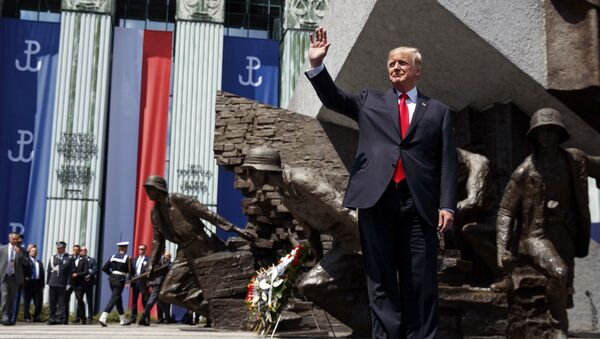 President Donald Trump waves as he arrives to deliver a speech at Krasinski Square at the Royal Castle, Thursday, July 6, 2017, in Warsaw - Sputnik International