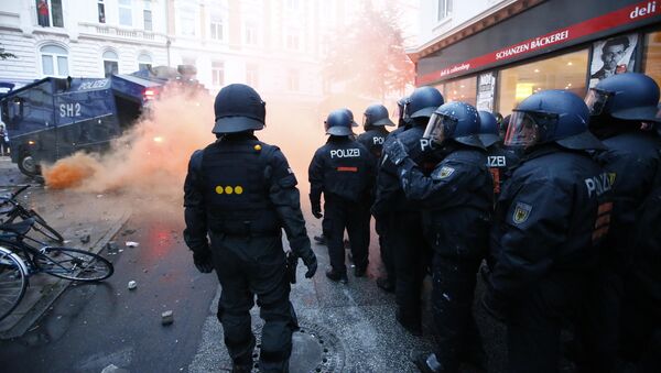 German riot police stand to guard protests during the G20 summit in Hamburg, Germany, July 7, 2017 - Sputnik International