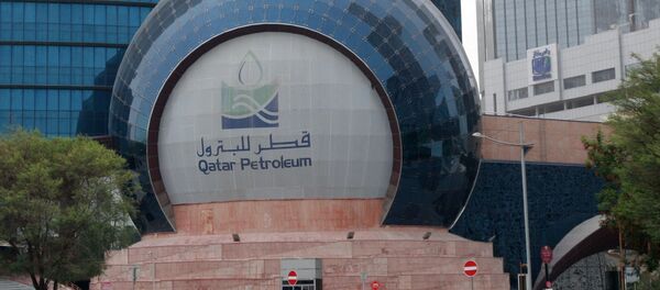 Cars are parked outside the headquartes of Qatar Petroleum in Doha, Qatar, July 8, 2017. Picture taken July 8, 2017. Cars are parked outside the headquartes of Qatar Petroleum in Doha, Qatar, July 8, 2017. Picture taken July 8, 2017. - Sputnik International