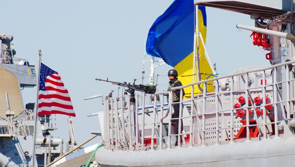 The Ukrainian Navy Hetman Sahaidachnyi frigate (R) and United States Navy missile destroyer Donald Cook (DDG-75) are moored near one another during the international drill Sea Breeze-2015 which officially begins in southern Ukrainian city of Odessa, on September 1, 2015. - Sputnik International
