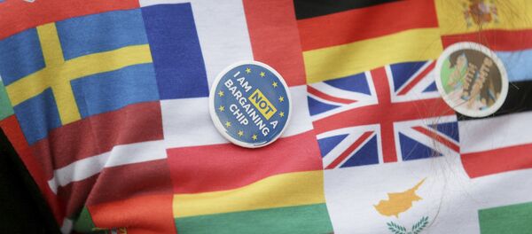 A demonstrator wears a badge in Parliament Square before a group of EU citizens of several nationalities, and including nurses, social workers and teaching assistants, lobby Members of Parliament over their right to remain in the UK, in London, Monday Feb. 20, 2017. A demonstrator wears a badge in Parliament Square before a group of EU citizens of several nationalities, and including nurses, social workers and teaching assistants, lobby Members of Parliament over their right to remain in the UK, in London, Monday Feb. 20, 2017. - Sputnik International