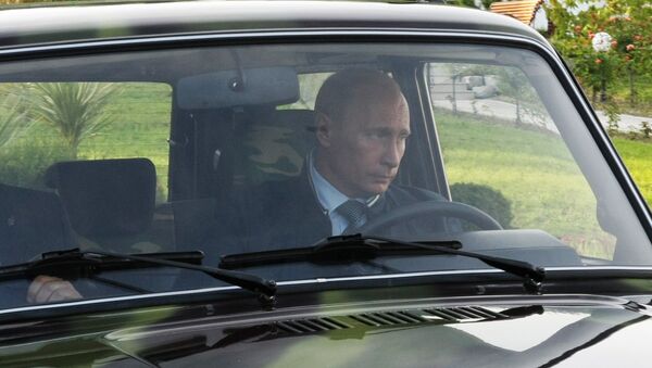 Vladimir Putin driving a Niva SUV in Sochi - Sputnik International