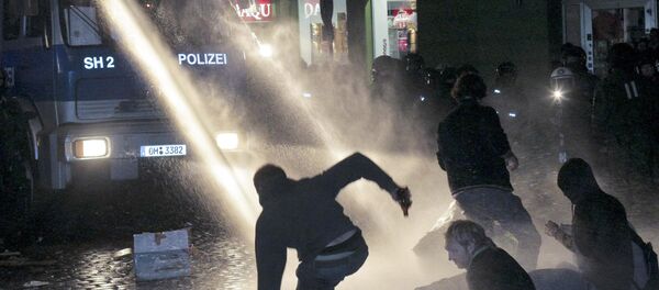 Police use water canons to quell street violence following a street festival, called Schanzenfest street festival which started peacefully in Hamburg, northern Germany, early Sunday Sept. 13, 2009. Police use water canons to quell street violence following a street festival, called Schanzenfest street festival which started peacefully in Hamburg, northern Germany, early Sunday Sept. 13, 2009. - Sputnik International