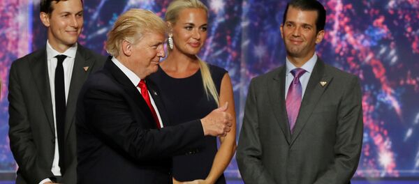 Donald Trump Jr. (R) watches along with his brother in law Jared Kushner (L) and Trump Jr's wife Vanessa (C) as his father Donald Trump (2nd L) celebrates after accepting the Republican presidential nomination at the 2016 Republican National Convention in Cleveland, Ohio U.S. July 21, 2016. - Sputnik International