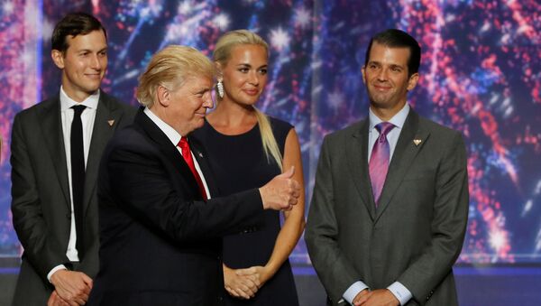 Donald Trump Jr. (R) watches along with his brother in law Jared Kushner (L) and Trump Jr's wife Vanessa (C) as his father Donald Trump (2nd L) celebrates after accepting the Republican presidential nomination at the 2016 Republican National Convention in Cleveland, Ohio U.S. July 21, 2016. - Sputnik International