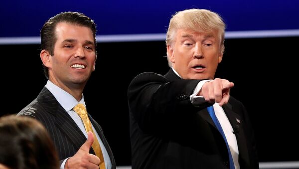 Donald Trump Jr. (L) gives a thumbs up beside his father Republican U.S. presidential nominee Donald Trump (R) after Trump's debate against Democratic nominee Hillary Clinton at Hofstra University in Hempstead, New York, U.S. September 26, 2016.  - Sputnik International