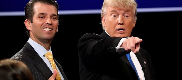 Donald Trump Jr. (L) gives a thumbs up beside his father Republican U.S. presidential nominee Donald Trump (R) after Trump's debate against Democratic nominee Hillary Clinton at Hofstra University in Hempstead, New York, U.S. September 26, 2016. Donald Trump Jr. (L) gives a thumbs up beside his father Republican U.S. presidential nominee Donald Trump (R) after Trump's debate against Democratic nominee Hillary Clinton at Hofstra University in Hempstead, New York, U.S. September 26, 2016. - Sputnik International