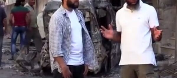 Bilal Abdul Kareem, right, interviewing, Shajul Islam left, a doctor believed to have jihadist tieswho has been accused in court of kidnapping journalists in Syria, Bilal Abdul Kareem, right, interviewing, Shajul Islam left, a doctor believed to have jihadist tieswho has been accused in court of kidnapping journalists in Syria, - Sputnik International