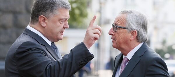 Ukrainian President Petro Poroshenko talks to European Commission President Jean-Claude Juncker before the EU-Ukraine summit in Kiev, Ukraine, July 13, 2017. Ukrainian President Petro Poroshenko talks to European Commission President Jean-Claude Juncker before the EU-Ukraine summit in Kiev, Ukraine, July 13, 2017. - Sputnik International